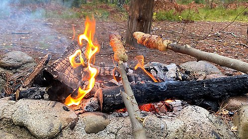 Grilla över öppen eld